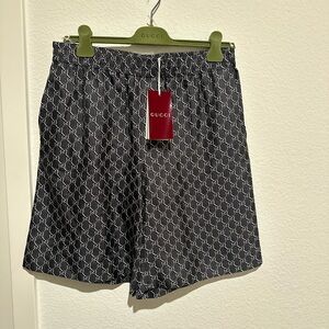 Authentic NWT Gucci Black and White Logo Patterned Shorts